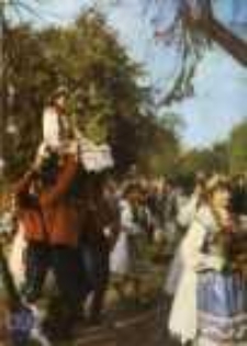 Zielona Góra; Królowa Dni Winobrania i Braci Winiarskiej w korowodzie winobraniowym, niesiona w koszu z winną latoroślą