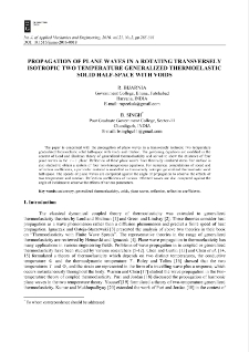 Propagation of plane waves in a rotating transversely isotropic two temperature generalized thermoelastic solid half-space with voids