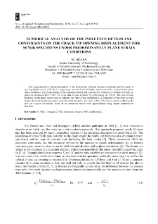 Numerical analysis of the influence of in-plane constraints on the crack tip opening displacement for SEN(B) specimens under predominantly plane strain conditions