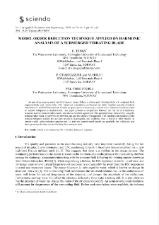 Model order reduction technique applied on harmonic analysis of a submerged vibrating blade