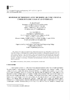Response of thermoelastic micropolar cubic crystal under dynamic load at an interface