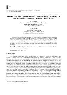 Reflection and transmission at the boundary surface of modified couple stress thermoelastic media