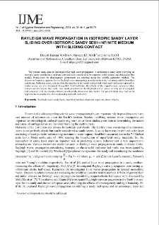 Rayleigh wave propagation in isotropic sandy layer sliding over isotropic sandy semi-infinite medium with sliding contact